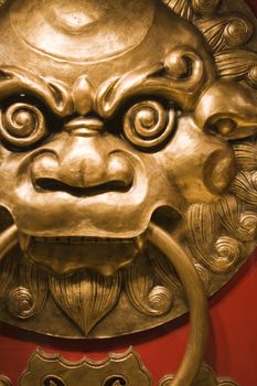 It is chinese style 
lionhead knocker door