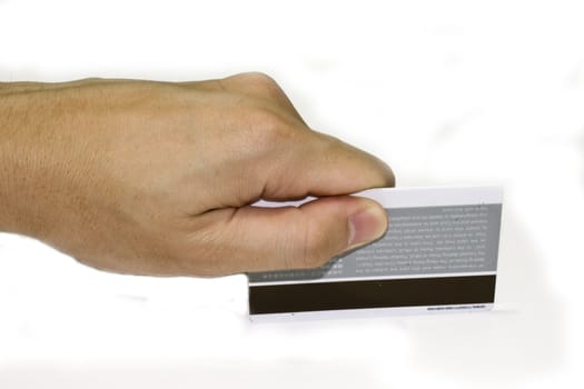 Hand holding a credit card on white background with clipping path