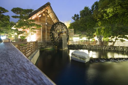 It is a waterwheel and a japan style house.