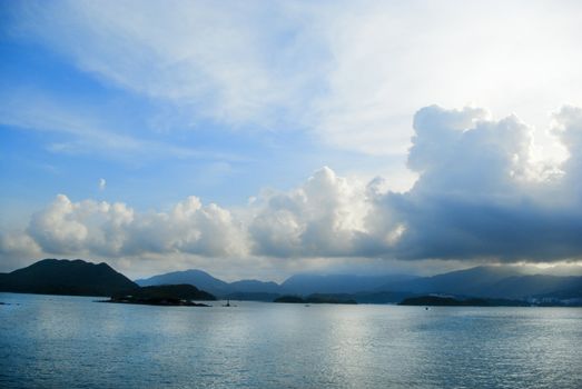 Blue sky above a blue surface of the sea.