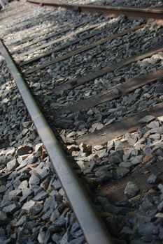 It is a close up of train rail