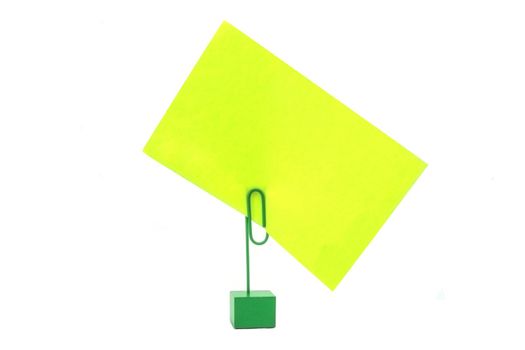 A card holder with a florescent green paper.