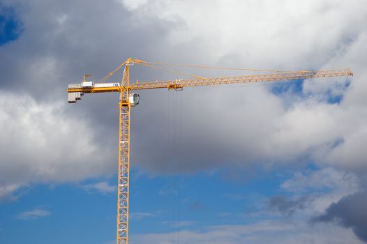 Lifting crane on building of the new house