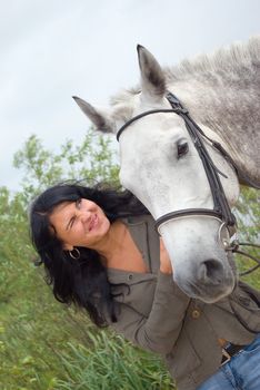 beautiful girl and horse.surprised girl