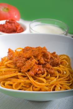 italian spaghetti pasta with fresh homemade tomato and chicken sauce