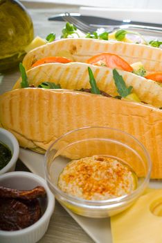 assortment of fresh homemade vegetarian  italian panini sandwich,typical italian snack