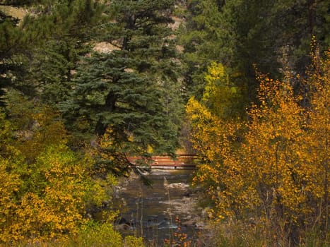 A bridge over the North Fork of the Big Thompson River in Glen Haven, Colorado.