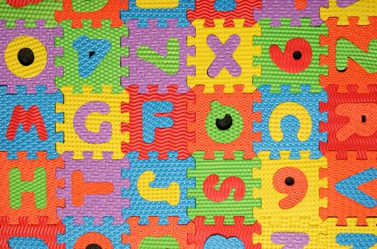 multi colored alphabet puzzle background