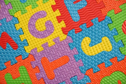 multi colored alphabet puzzle background