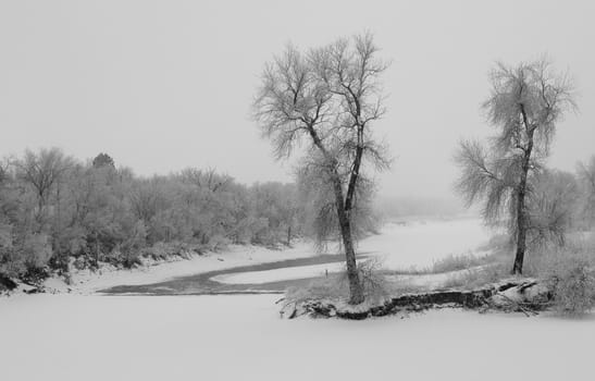 The James river in South Dakota on a frosty and foggy winter morning.