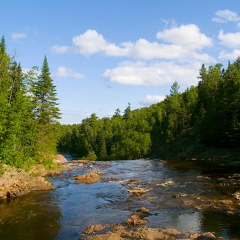 Over the high falls of the Baptism river in Northern Minnesota.