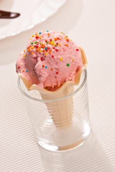 food series: pink strawberry ice-cream in waffle cup
