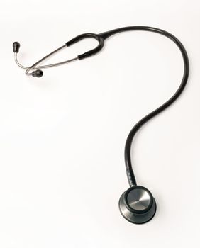 An isolated stethoscope in the shape of a question mark.  Clipping path included.
