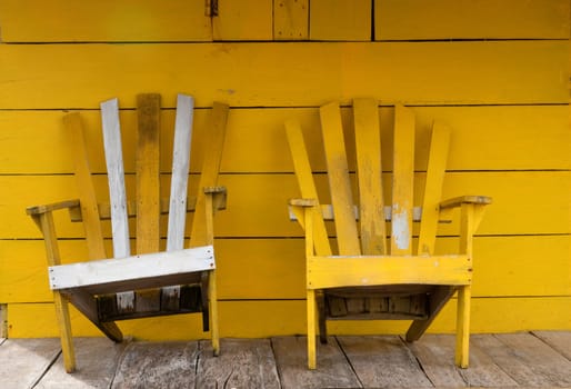 the picture of the yellow wooden chairs