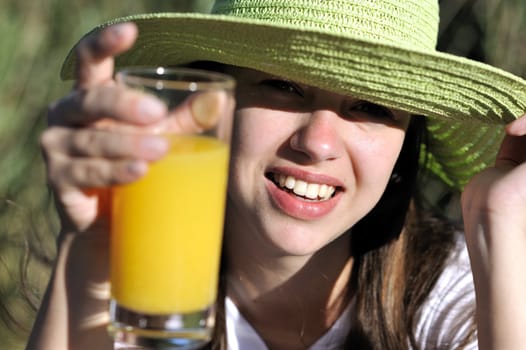 Woman drinking her orange juice