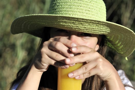 Woman drinking her orange juice