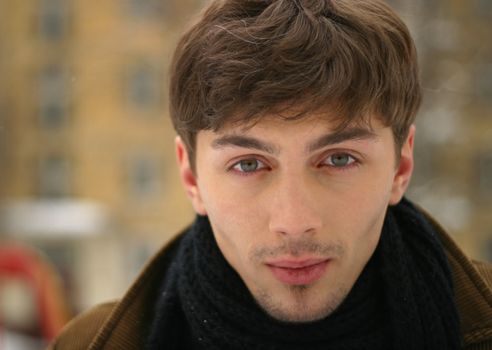 Portrait of the young man in the winter