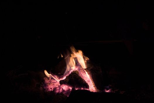 small fire isolated on the black background