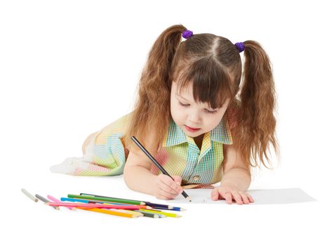 The child draws a crayon drawing on white