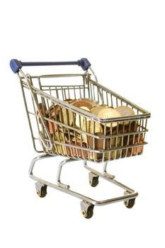 Shopping trolley with money isolated on white background