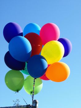 A bouquet of colorful balloons in the sky