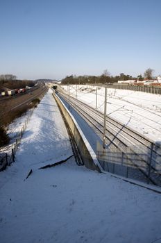 A view of a rail track covered in a layer of snow