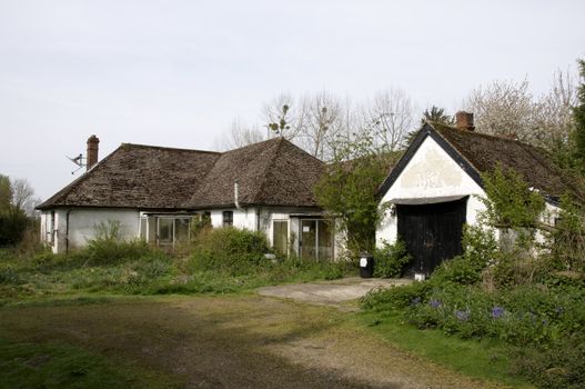 An old run-down and abandoned bungalow in the English countryside