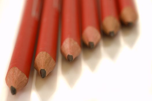 close-up of six pencils, on white background