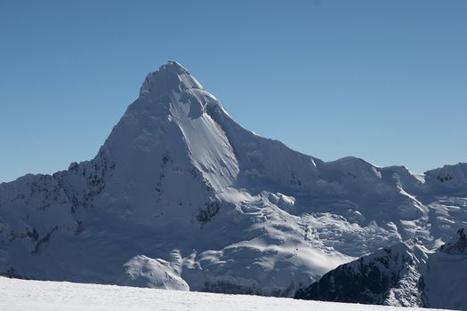 Nevada Artesonraju, which is rumored to be a prototype for Paramount Pictures logo. Cordillera Blanca, Peru.