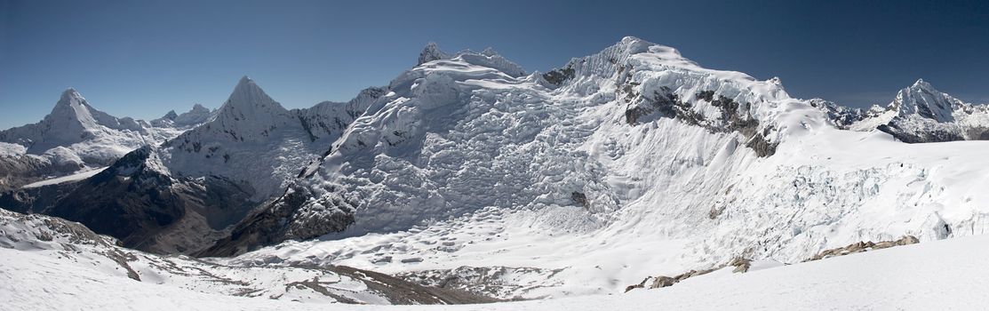 Panoramic photo of Artesonraju, Piramide and Pisco mountains. Cordillera Blanca, Peru.