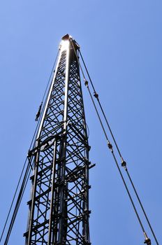 Detail of a crane arm against the sky