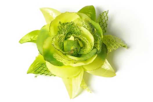 A flower hair clip for women on isolated white background.