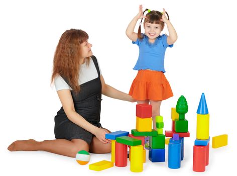 Mother and daughter playing with colored blocks on a white background