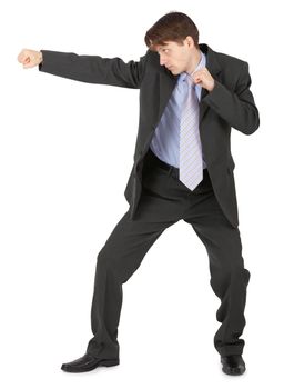 A man in a black suit, punching, standing on a white background