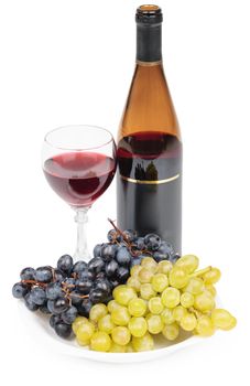 A bottle of wine, glass and grapes on a white background - still life