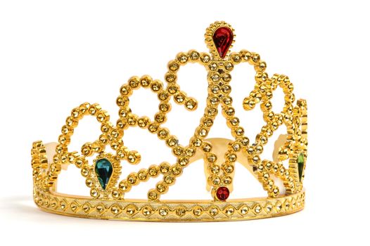 Gold tiara studded with jewels and diamonds.