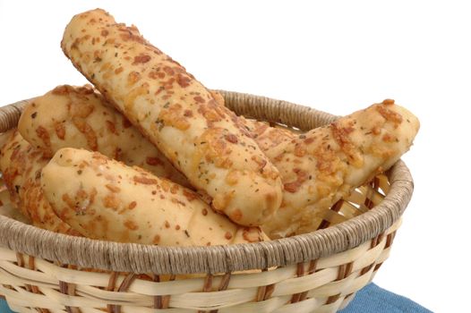 Basket of fresh garlic and cheese breadsticks.