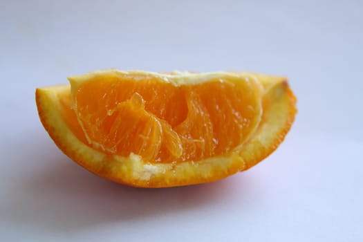 Vivid juicy orange on white background
