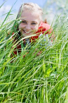 Beautiful smiling girl gathering flowers. #4