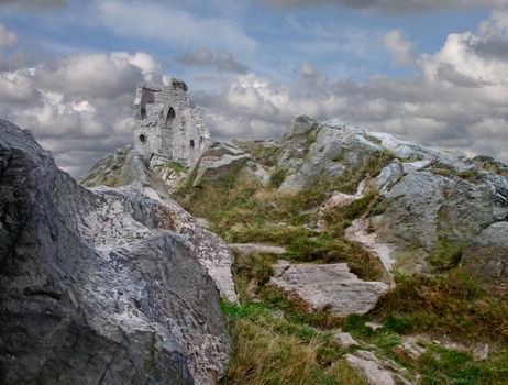 Mow Cop castle stands on top of a hill at the edge of the Cheshire plain in England.