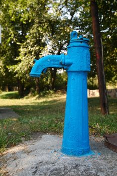 Old broken water-pump in the park