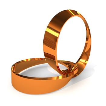 Pair of golden wedding rings twisted together with shadow