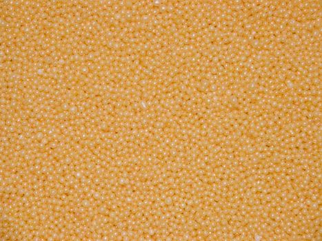 A background consisting of small granules of yellow colour