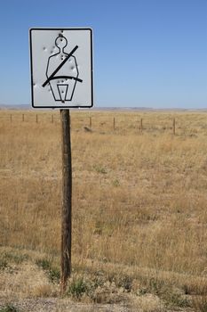 Shot out road sign in Wyoming