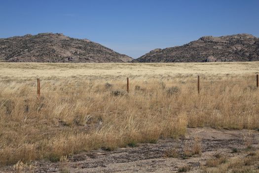 A fence marks territory in Wyoming's back country.
