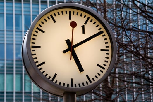 Public clock shot in Canary Wharf, London