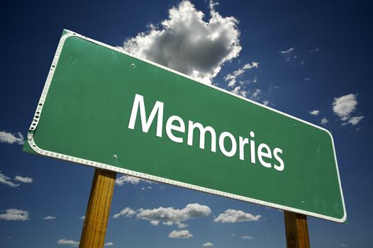 Memories Road Sign with dramatic clouds and sky.