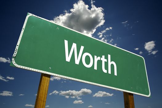 Worth Road Sign with dramatic clouds and sky.
