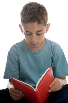 a boy reading in a book