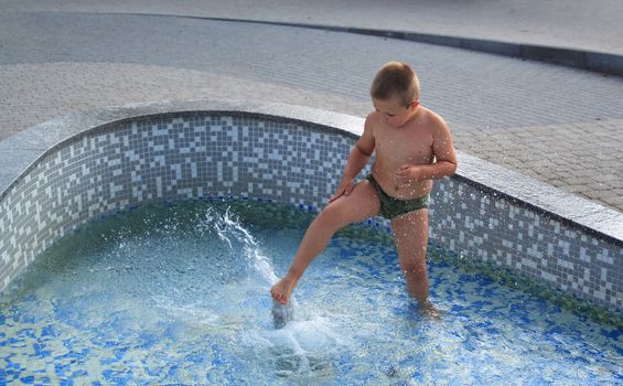 Boy In The Fountain
